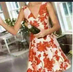 Party/cocktail printed orange and  white mini dress casual or dressy back zipper